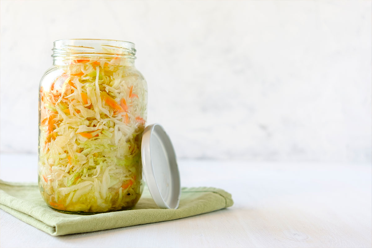 Homemade sauerkraut in a glass jar