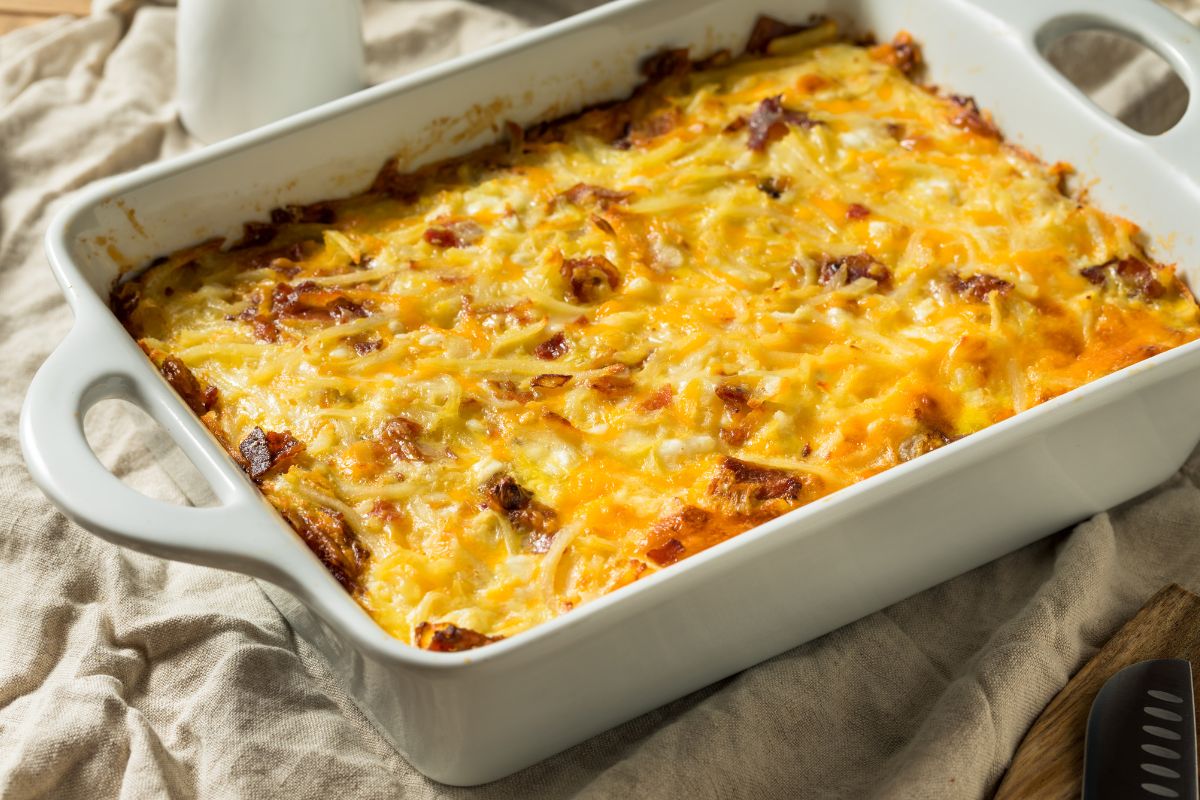 Casserole with corned beef topped with cheese